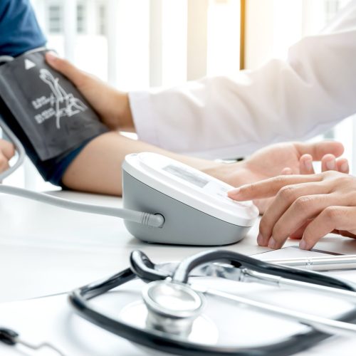The,Doctor,Measured,Blood,Pressure,,The,Patient,Examined,The,Heartbeat